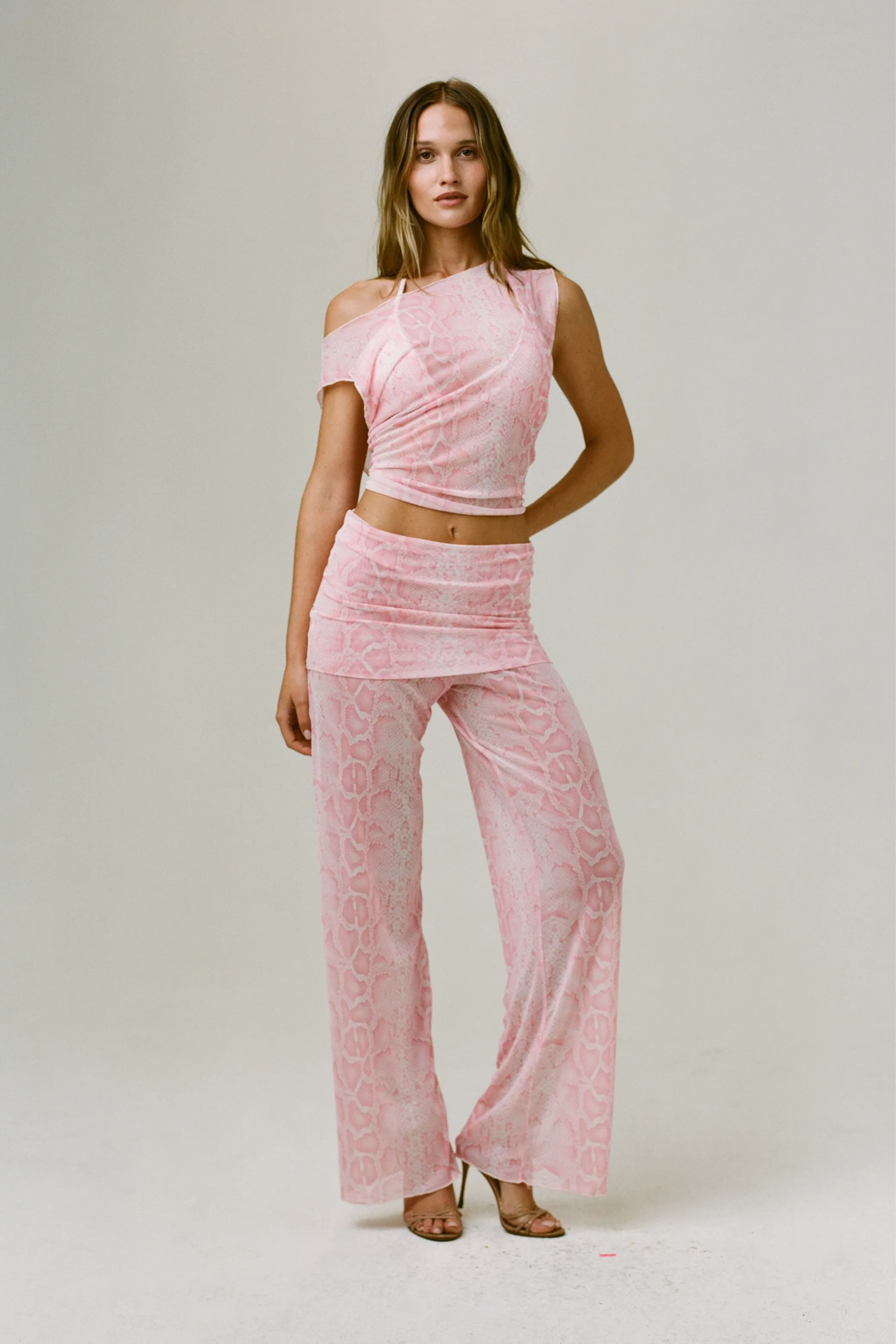 THE ADDISON PANT IN PINK SNAKE sold by Bella Venice