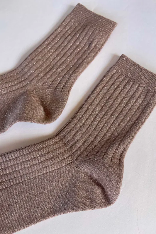 Her Socks sold by Hills Dry Goods