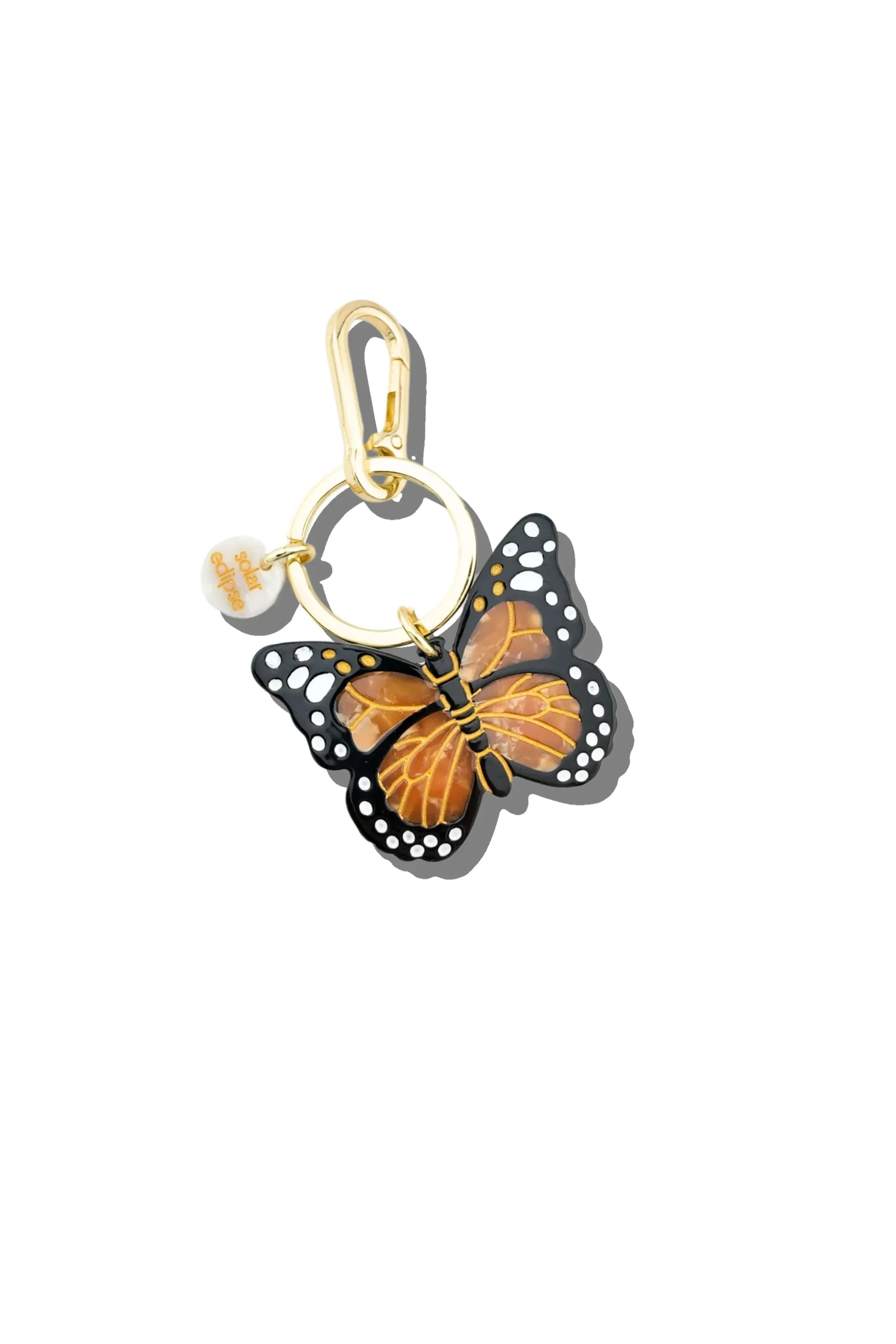 Hand-painted Monarch Butterfly Bag Charm + Keychain sold by Hills Dry Goods