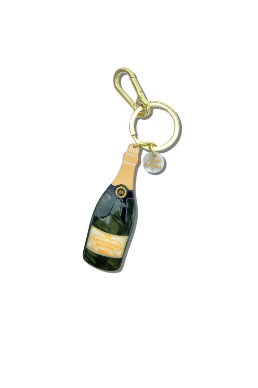 Hand-painted Champagne Bag Charm + Keychain sold by Hills Dry Goods