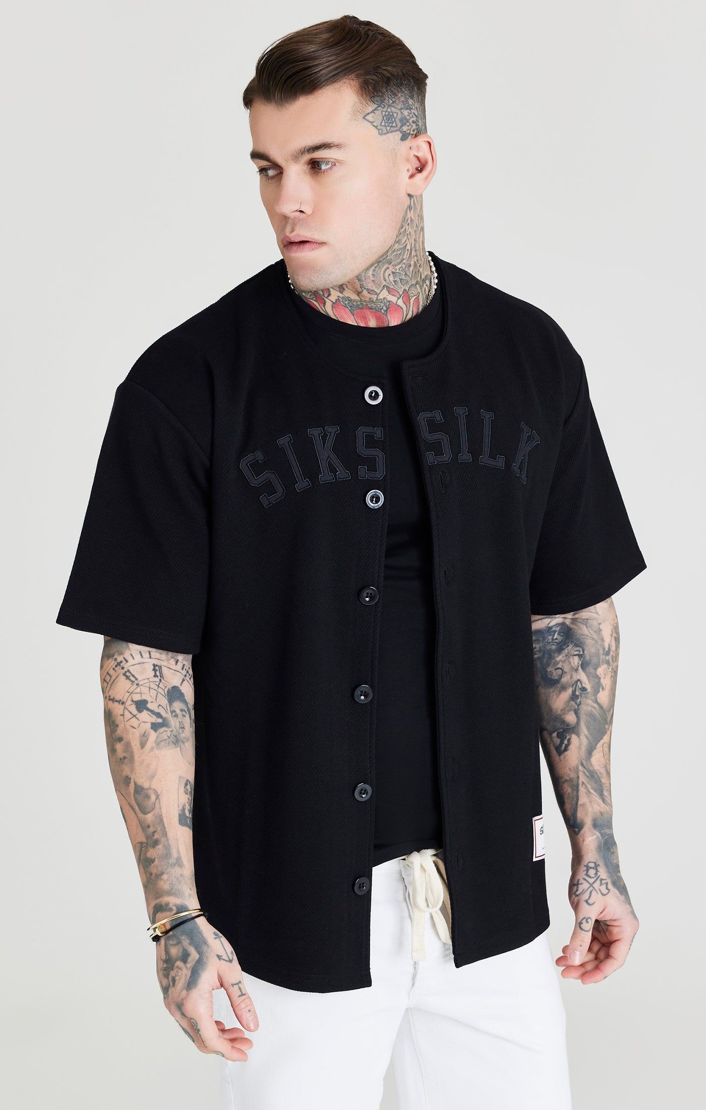 Black Applique Logo Baseball Jersey sold by Siksilk
