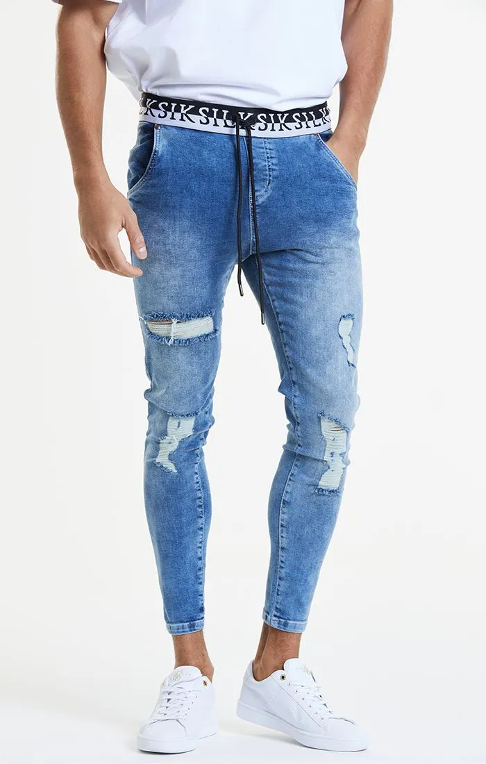 Blue Distressed Elasticated Jean sold by Siksilk