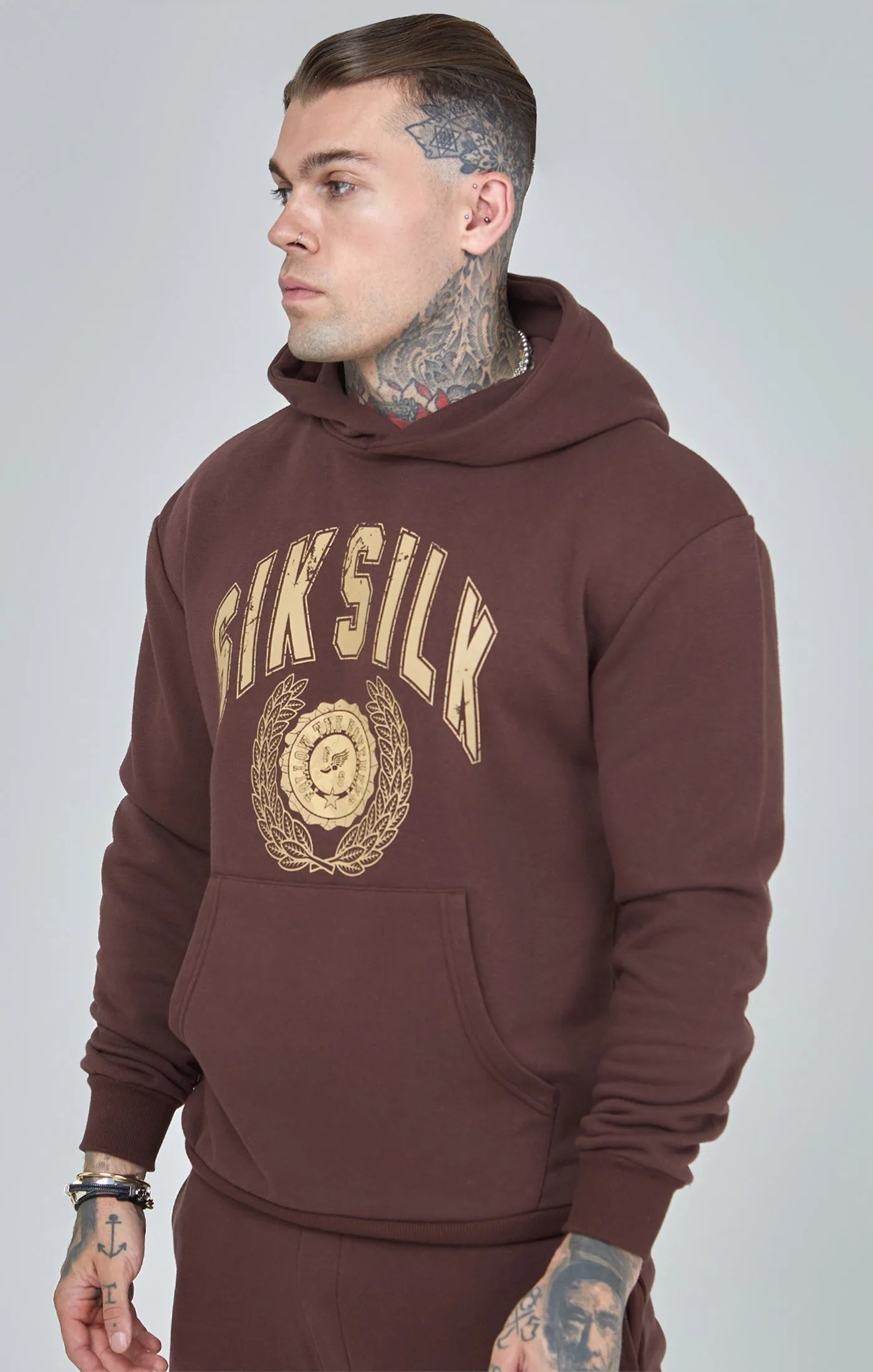 Oversized Varsity Logo Hoodie sold by Siksilk