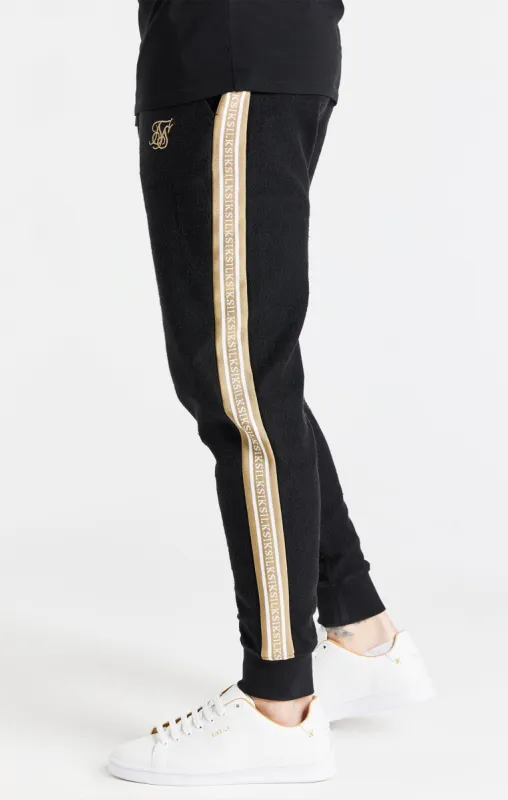 Black Eminent Loop Back Cuff Pant sold by Siksilk