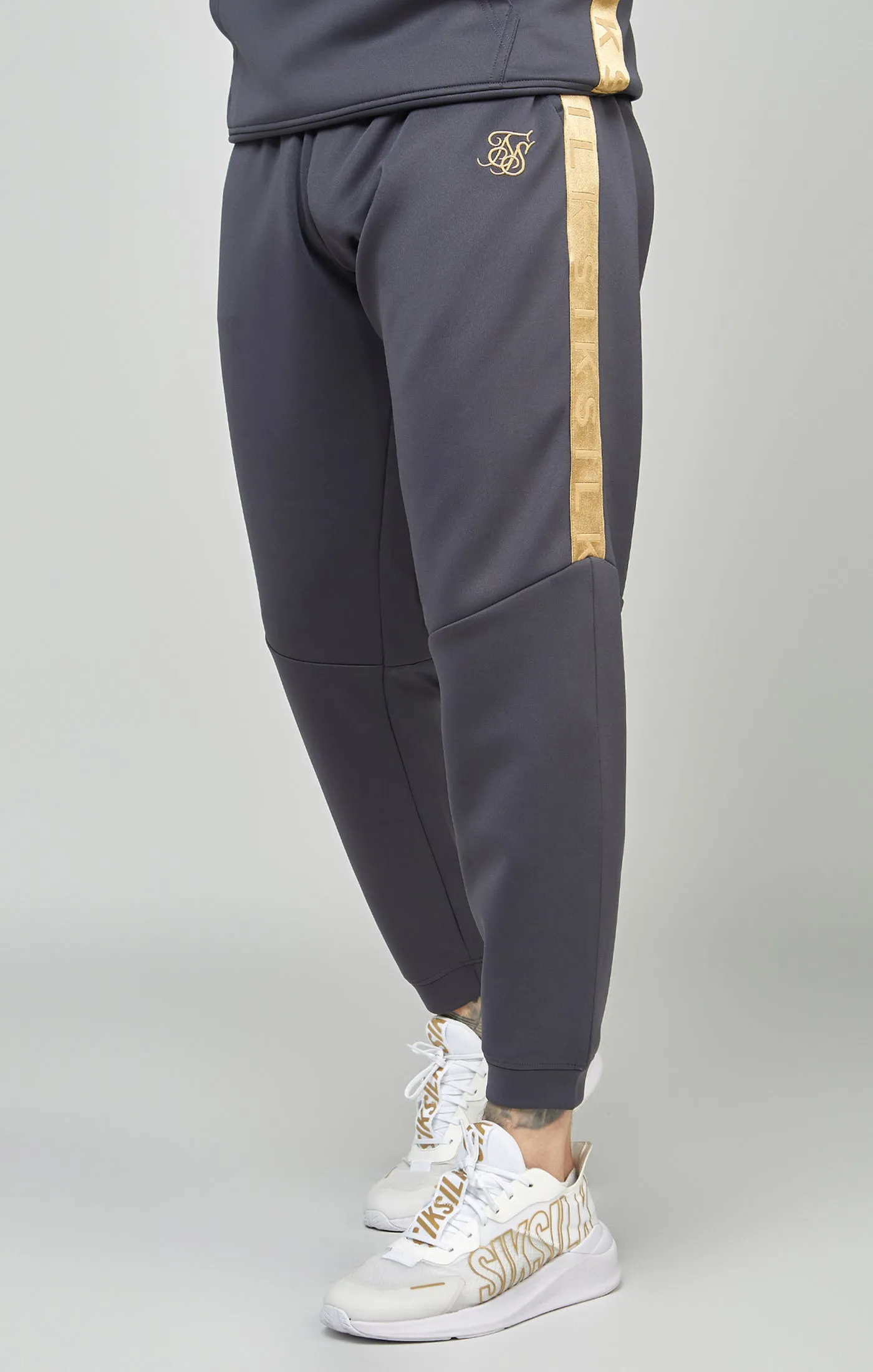 Gold Tape Jogger sold by Siksilk