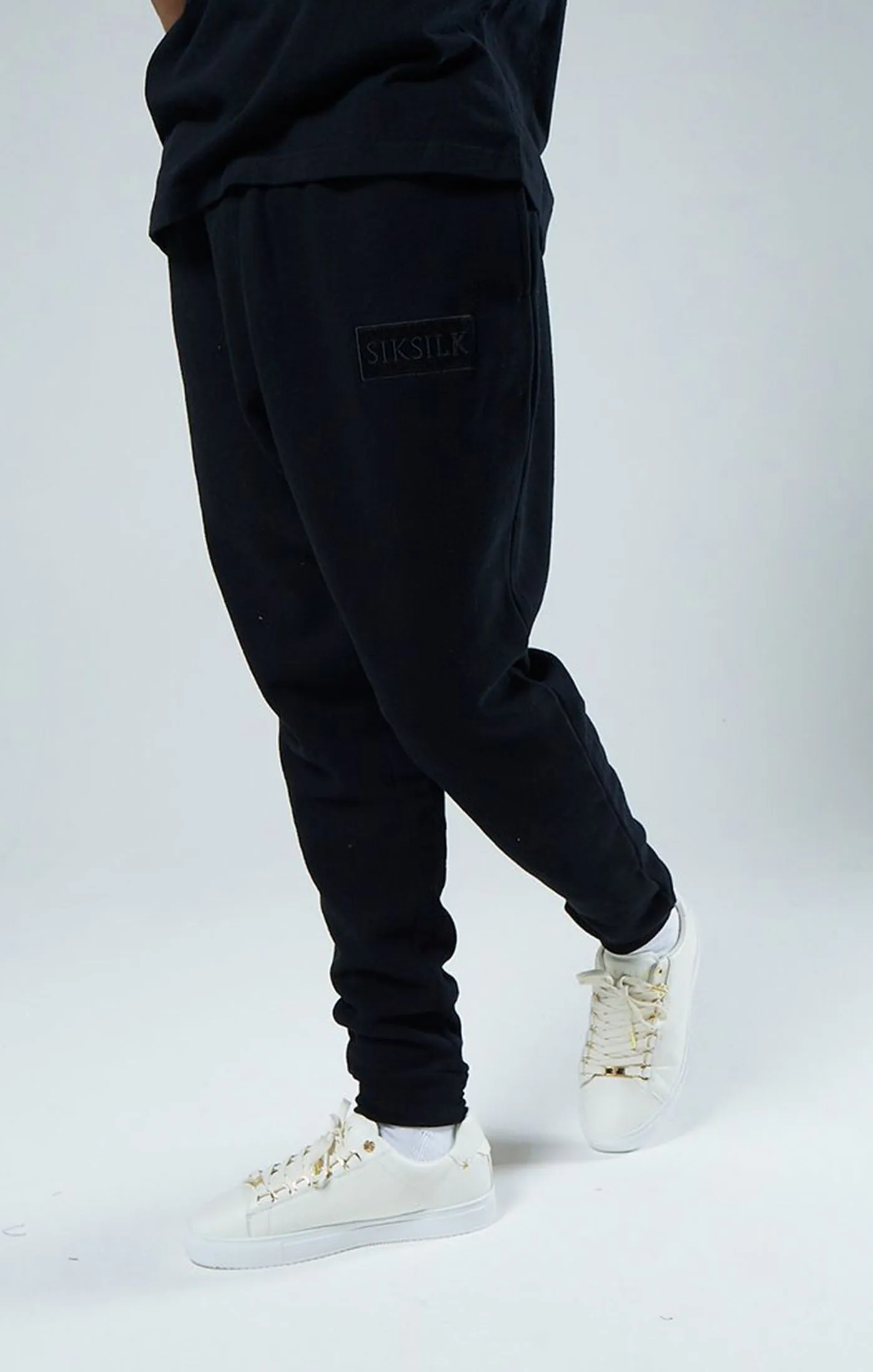 Black Relaxed Fit Cuffed Jogger sold by Siksilk