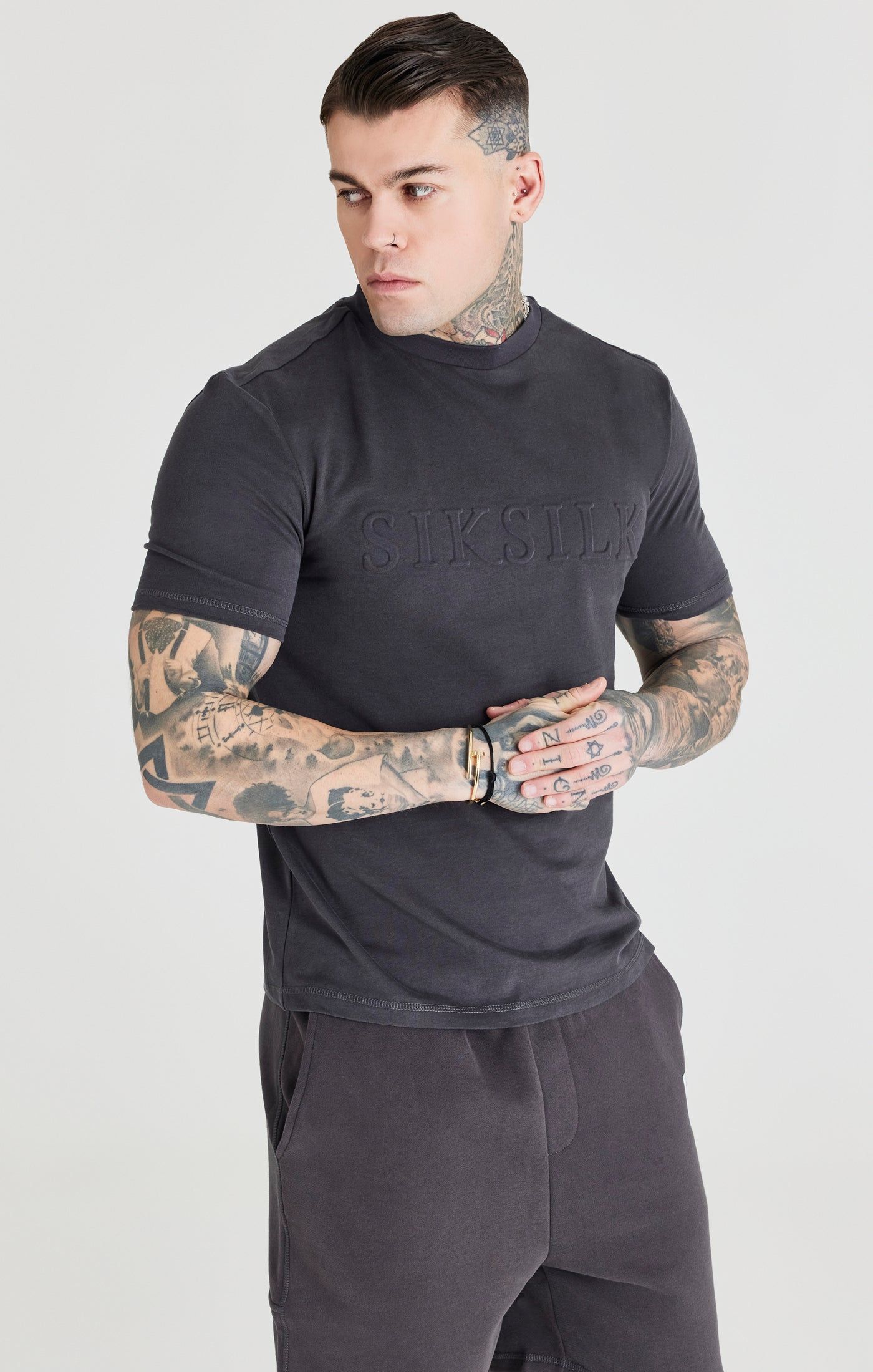 Black Embossed Relaxed Fit T-Shirt sold by Siksilk