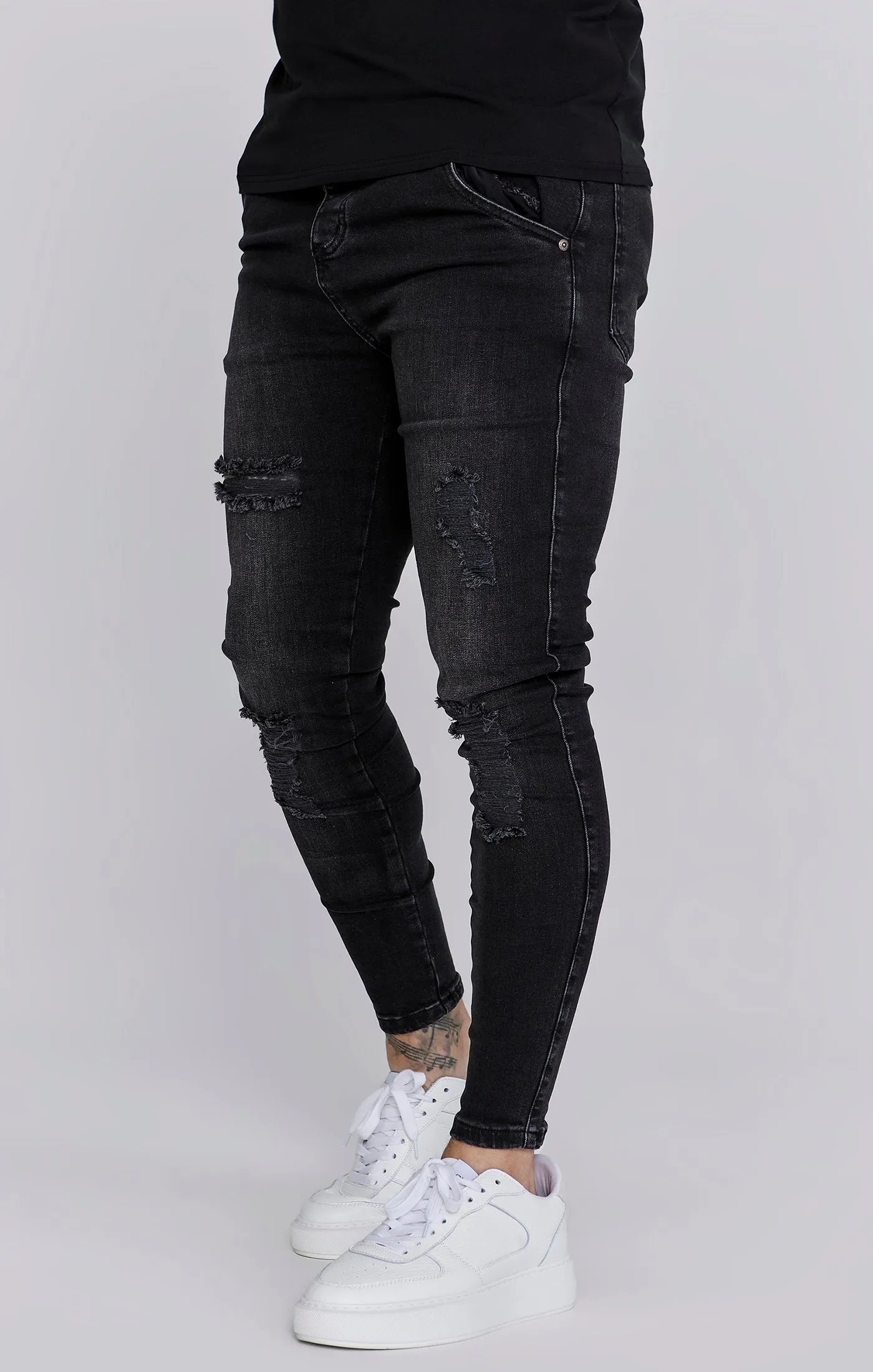 Black Washed Essential Distressed Skinny Jean sold by Siksilk