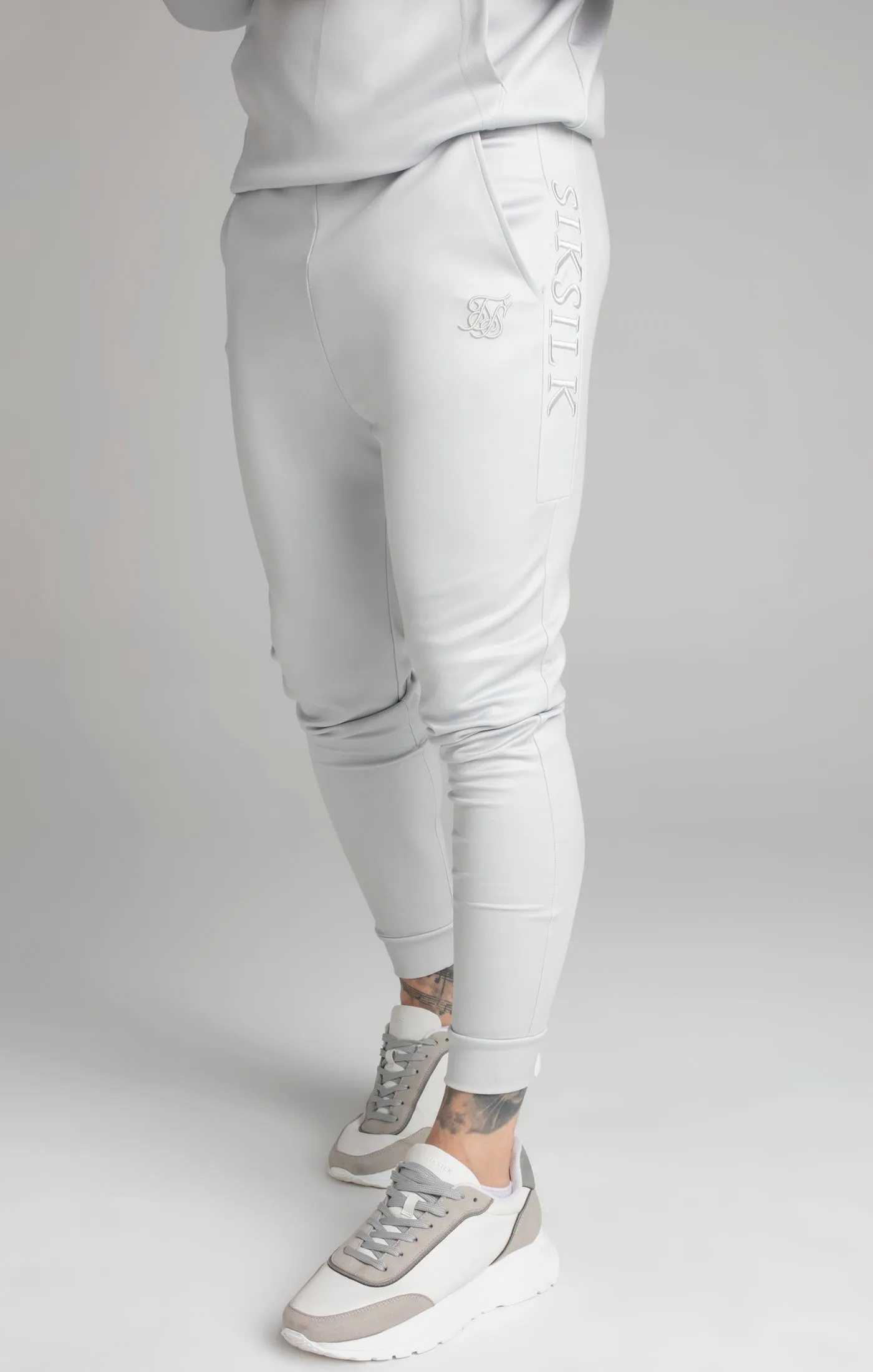 Grey Embroidered Panel Cuffed Pant sold by Siksilk