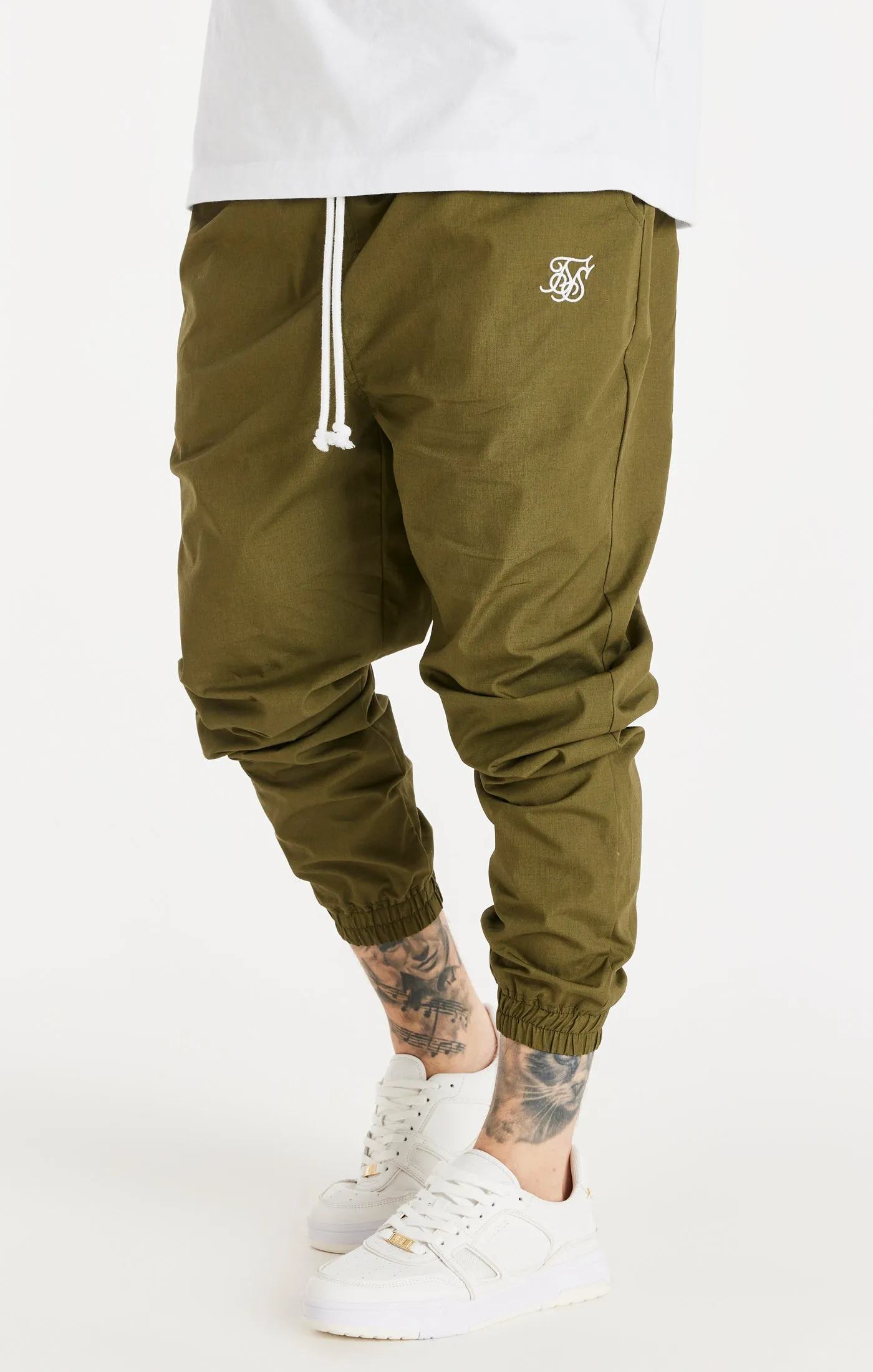 Khaki Essential Relaxed Trousers sold by Siksilk
