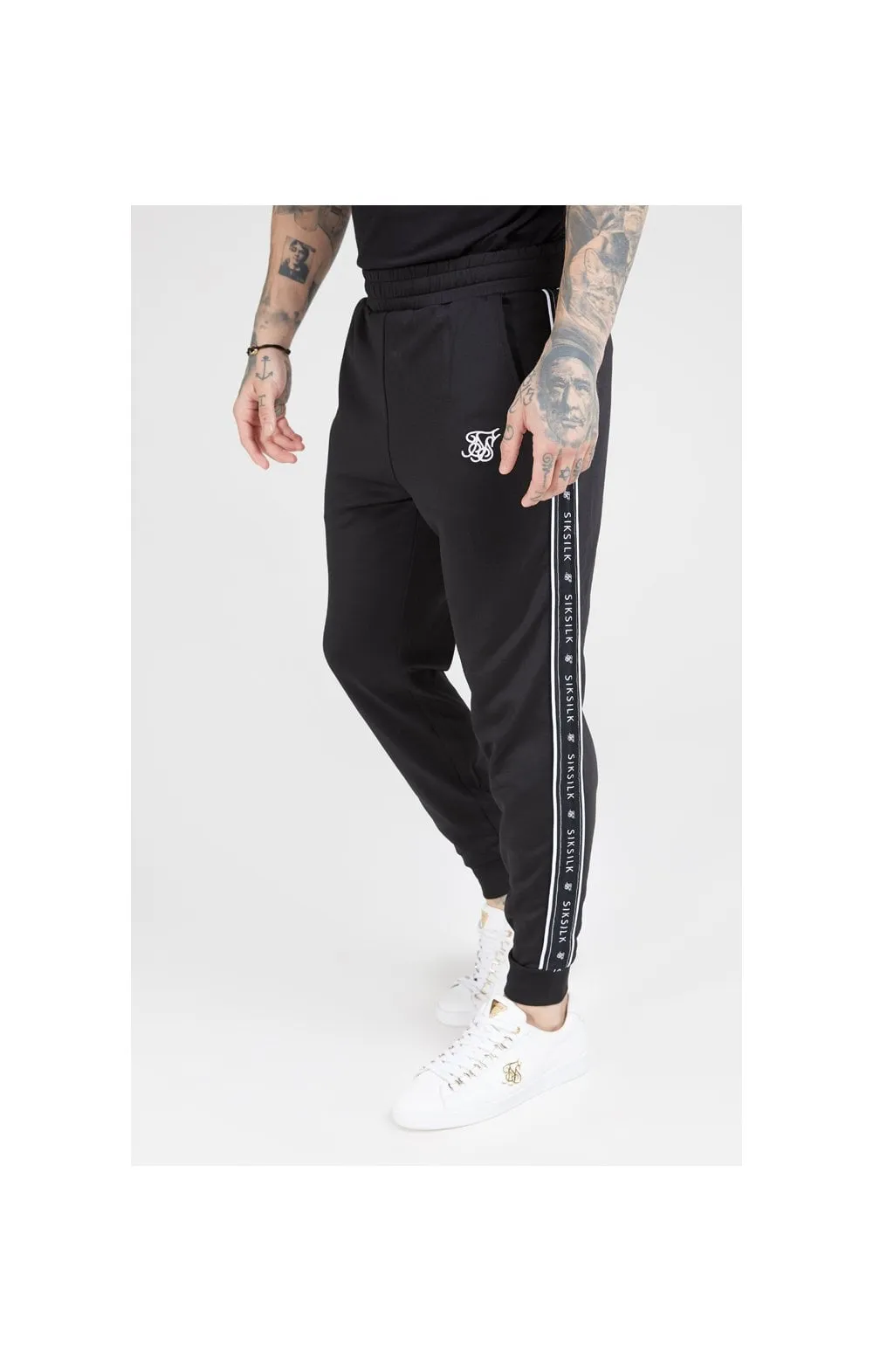 SikSilk Fitted Panel Tape Track Pants – Black sold by Siksilk