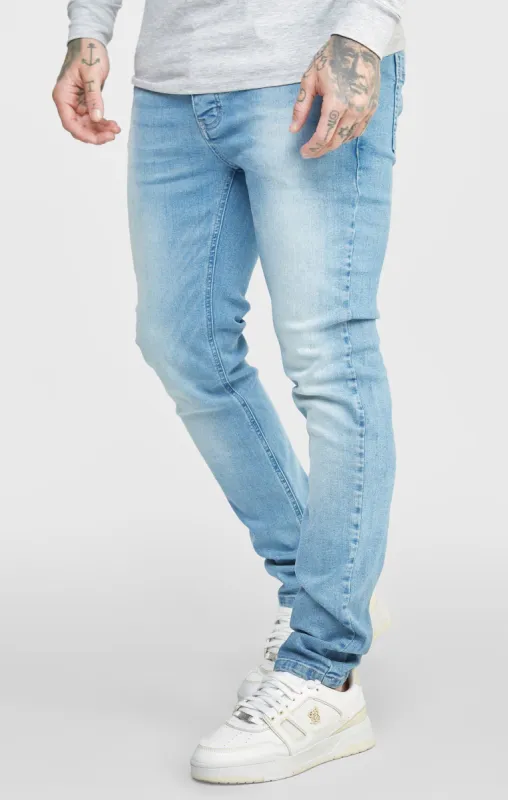 Blue Wash Slim Fit Denim sold by Siksilk
