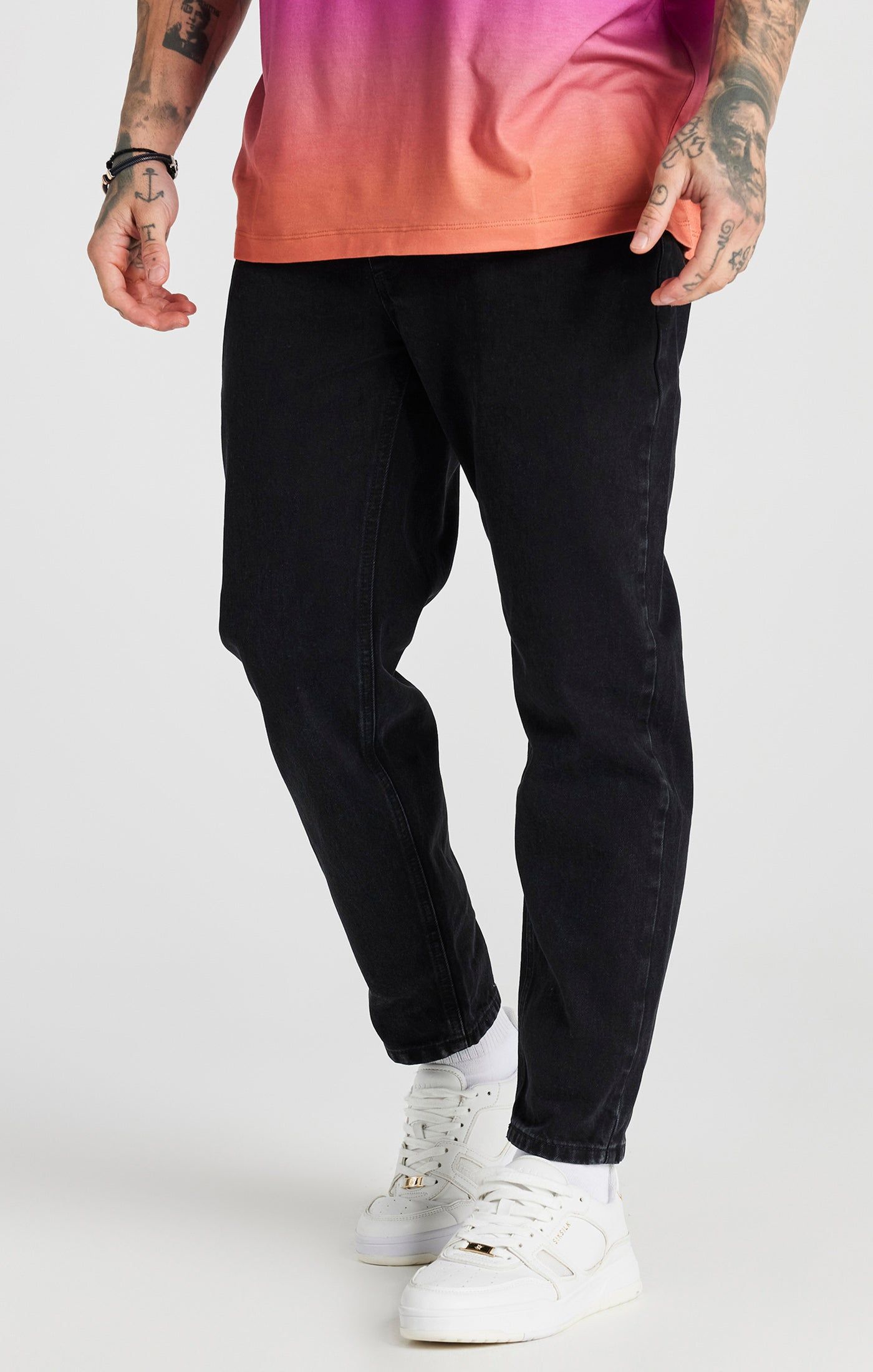 Black Basic Carrot Jean sold by Siksilk