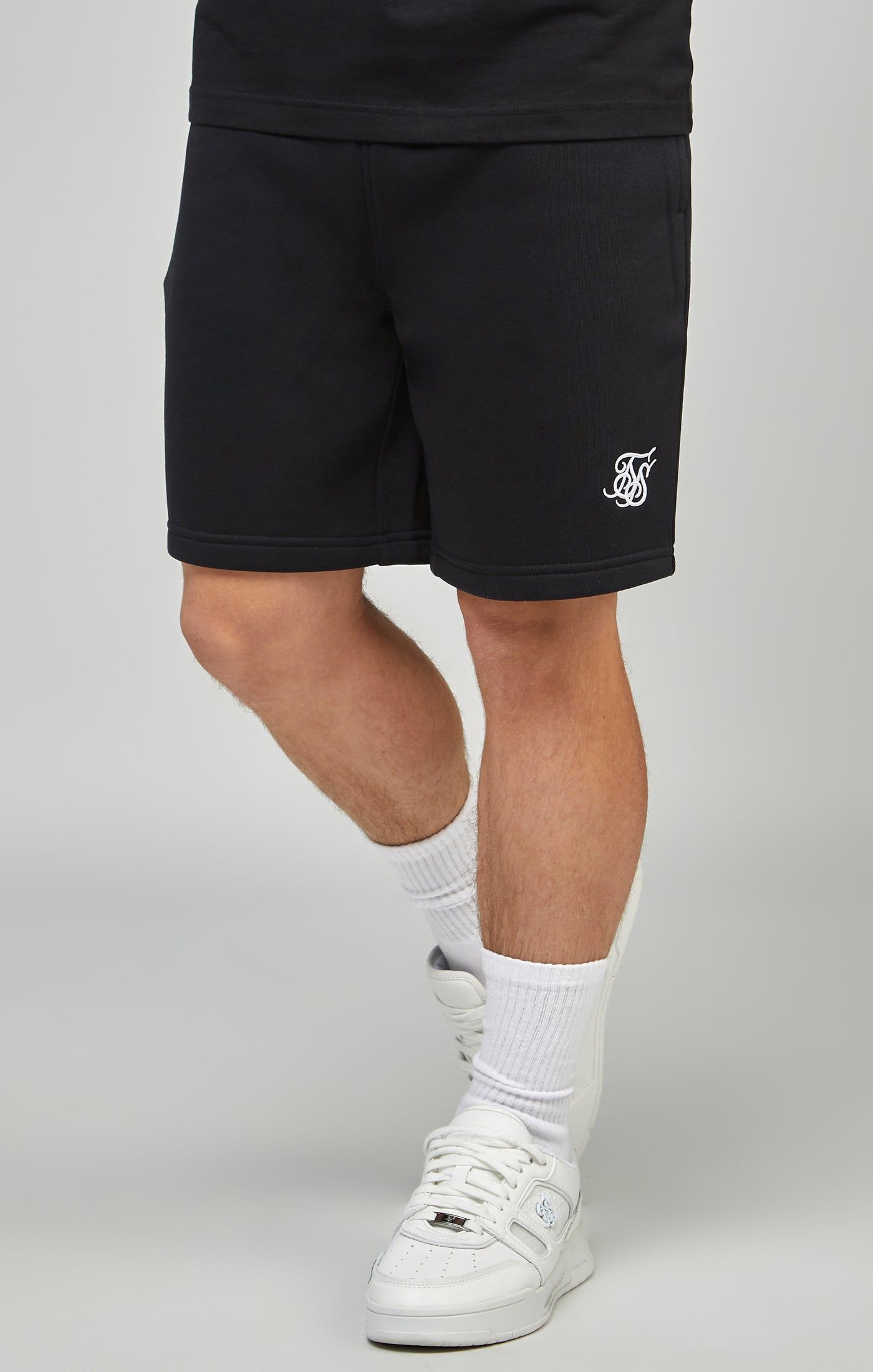 Boys Black Essentials Fleece Shorts sold by Siksilk