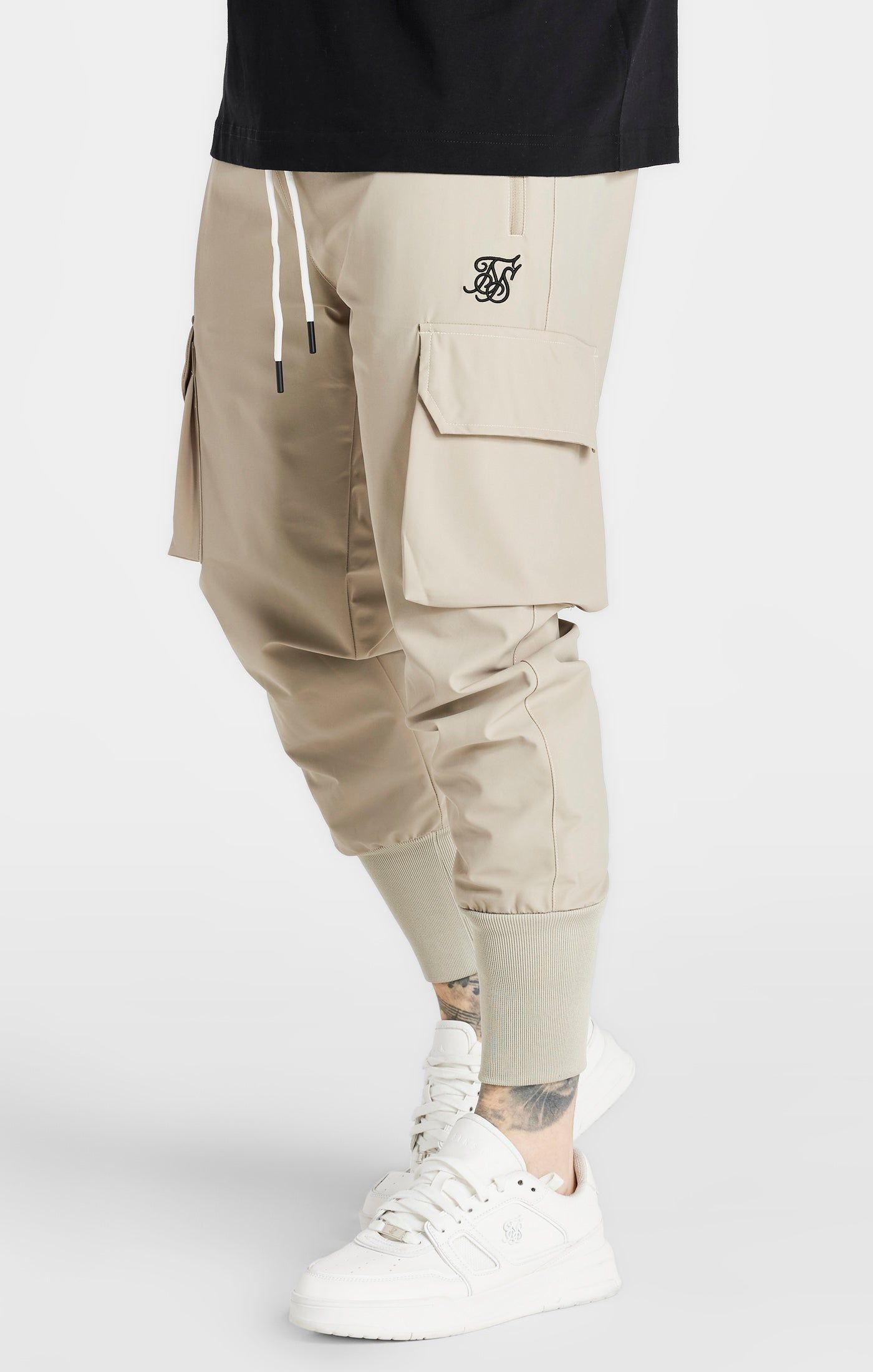 Beige Tech Cargo Pant sold by Siksilk