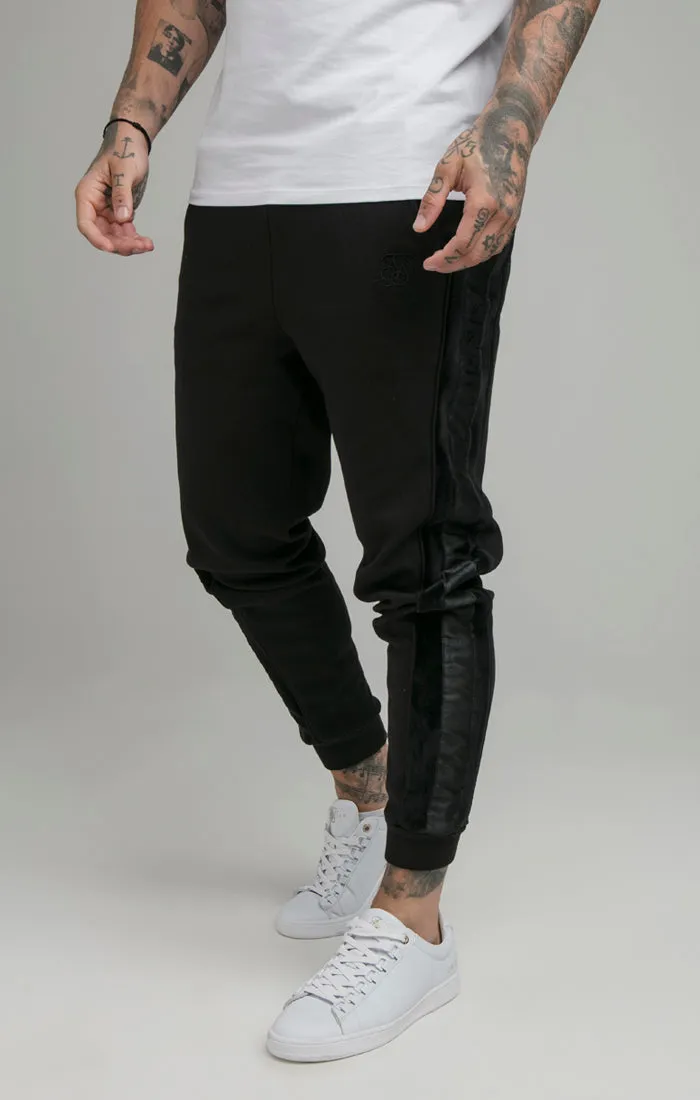 Black Opulent Taped Cuffed Pant sold by Siksilk