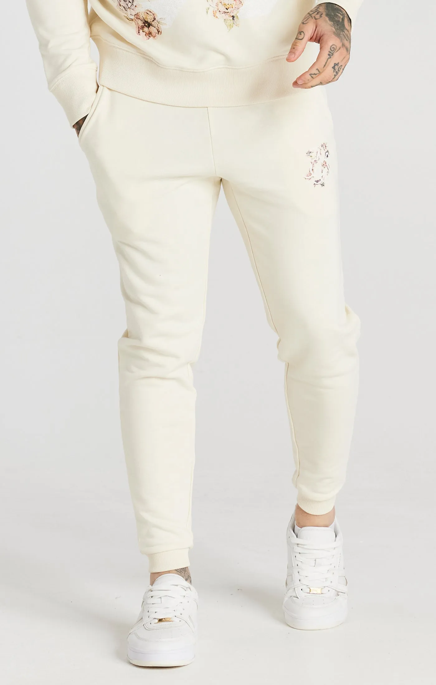 Ecru Faded Floral Jogger sold by Siksilk