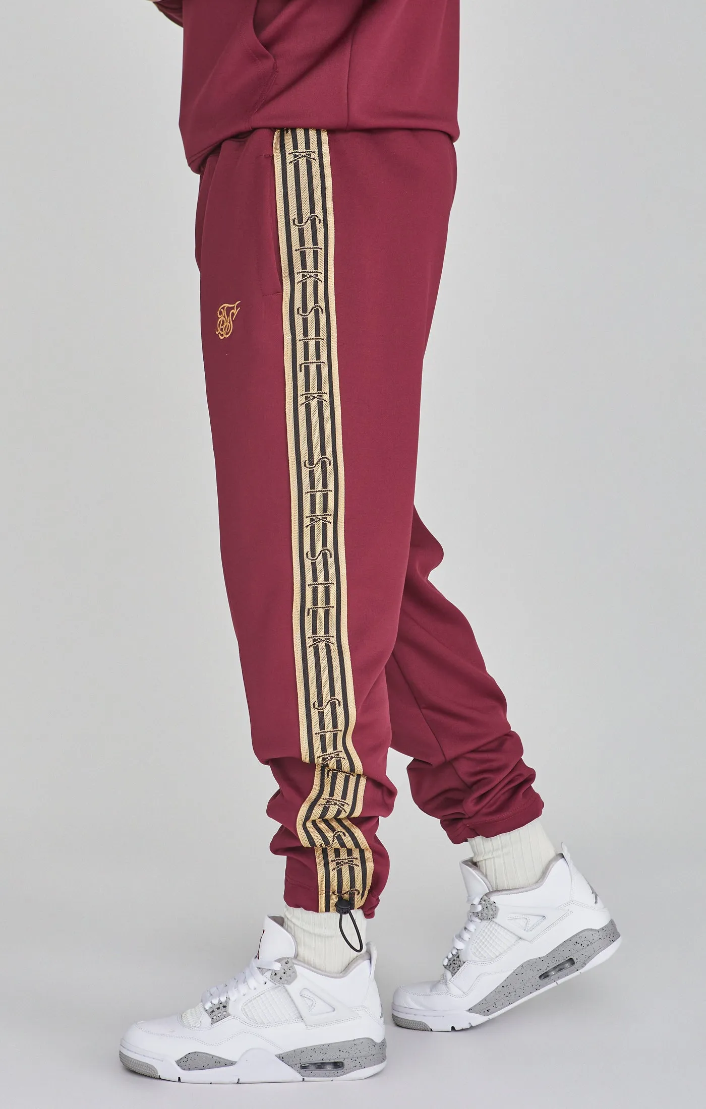 Burgundy Joggers sold by Siksilk