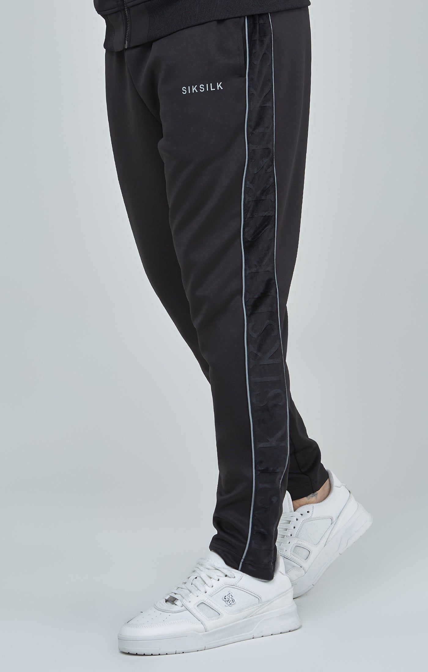 Black Velour Panelled Track Pants sold by Siksilk