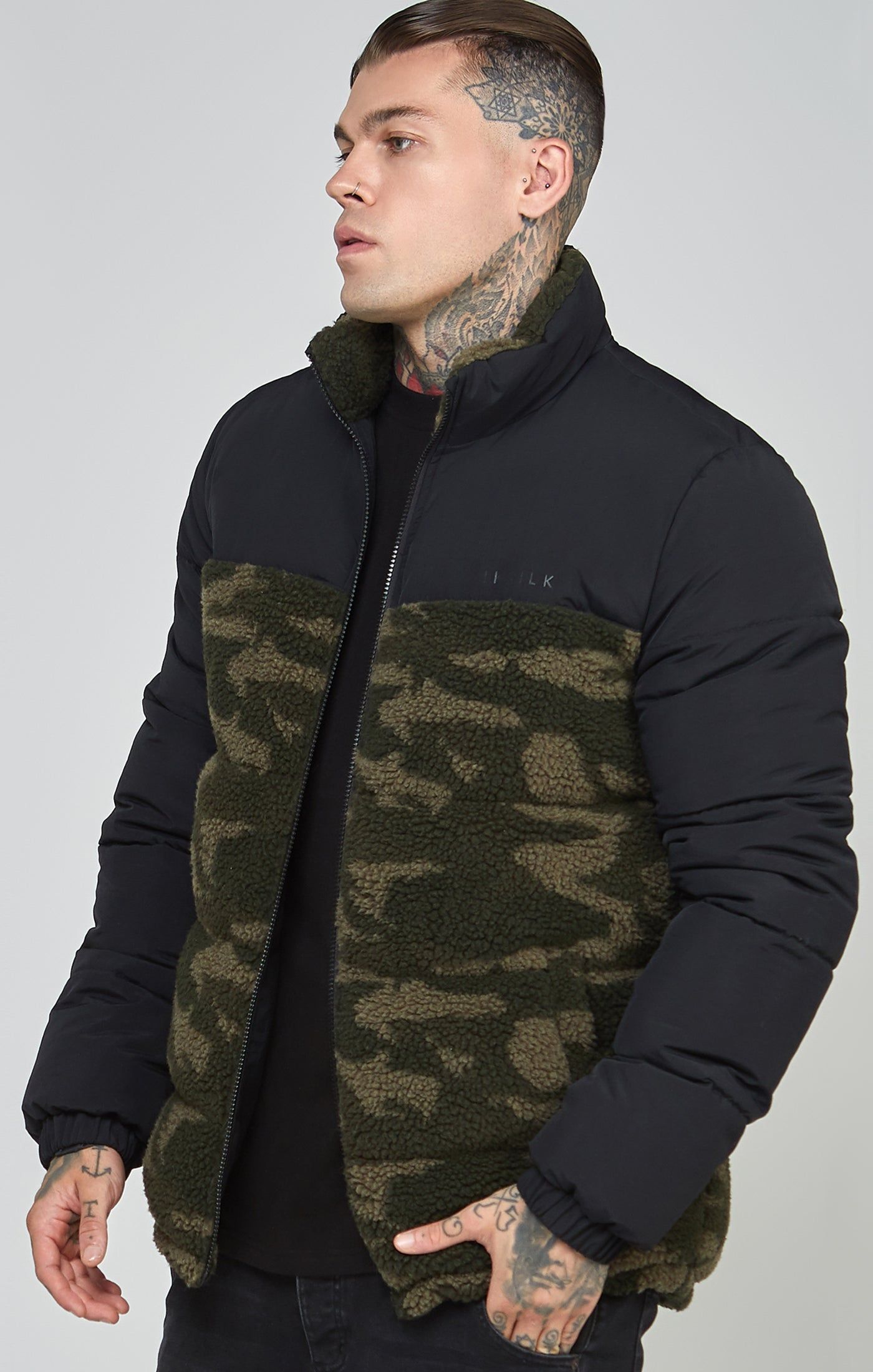 Black Sherpa Bubble Jacket sold by Siksilk