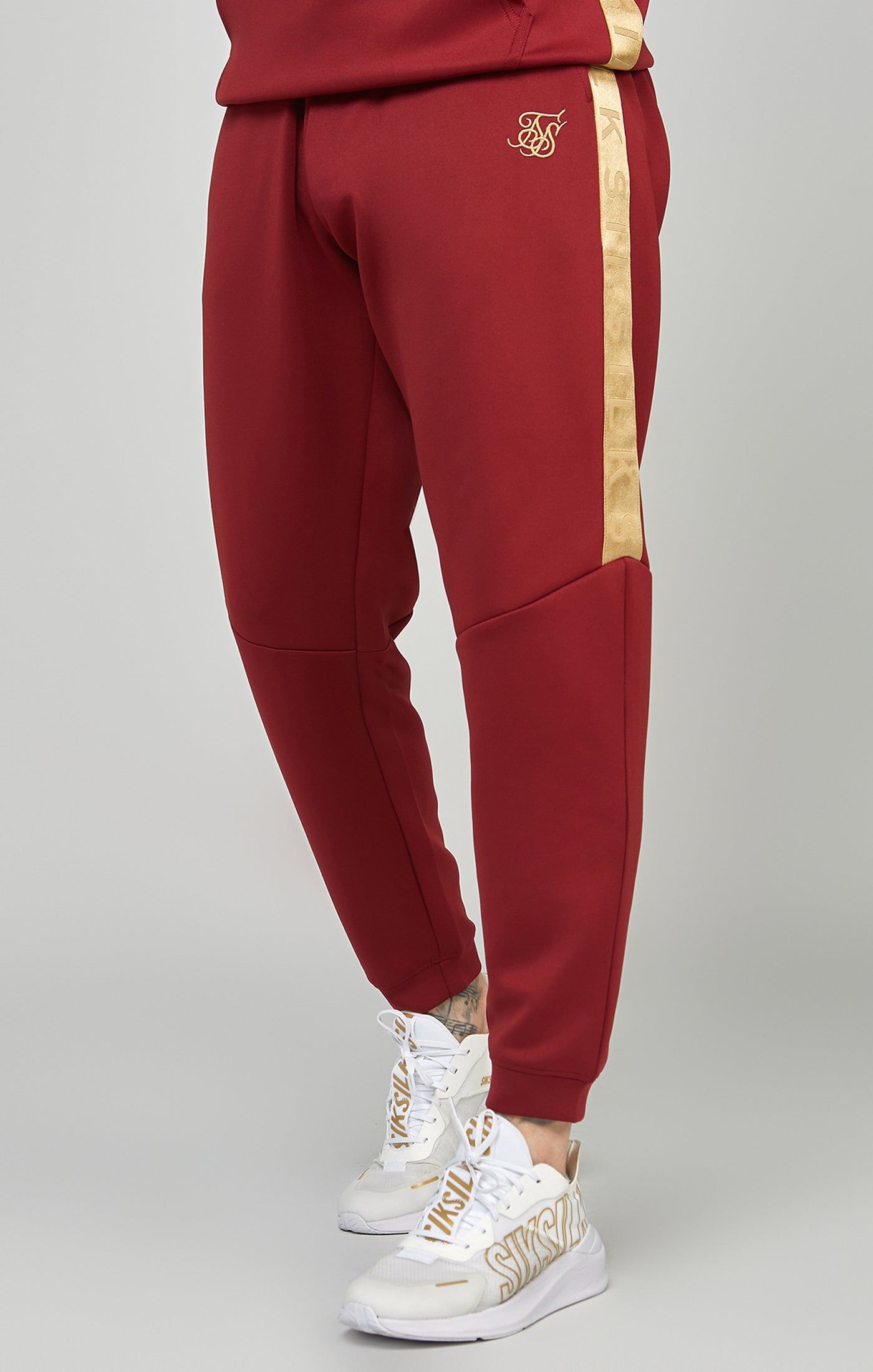 Gold Tape Jogger sold by Siksilk