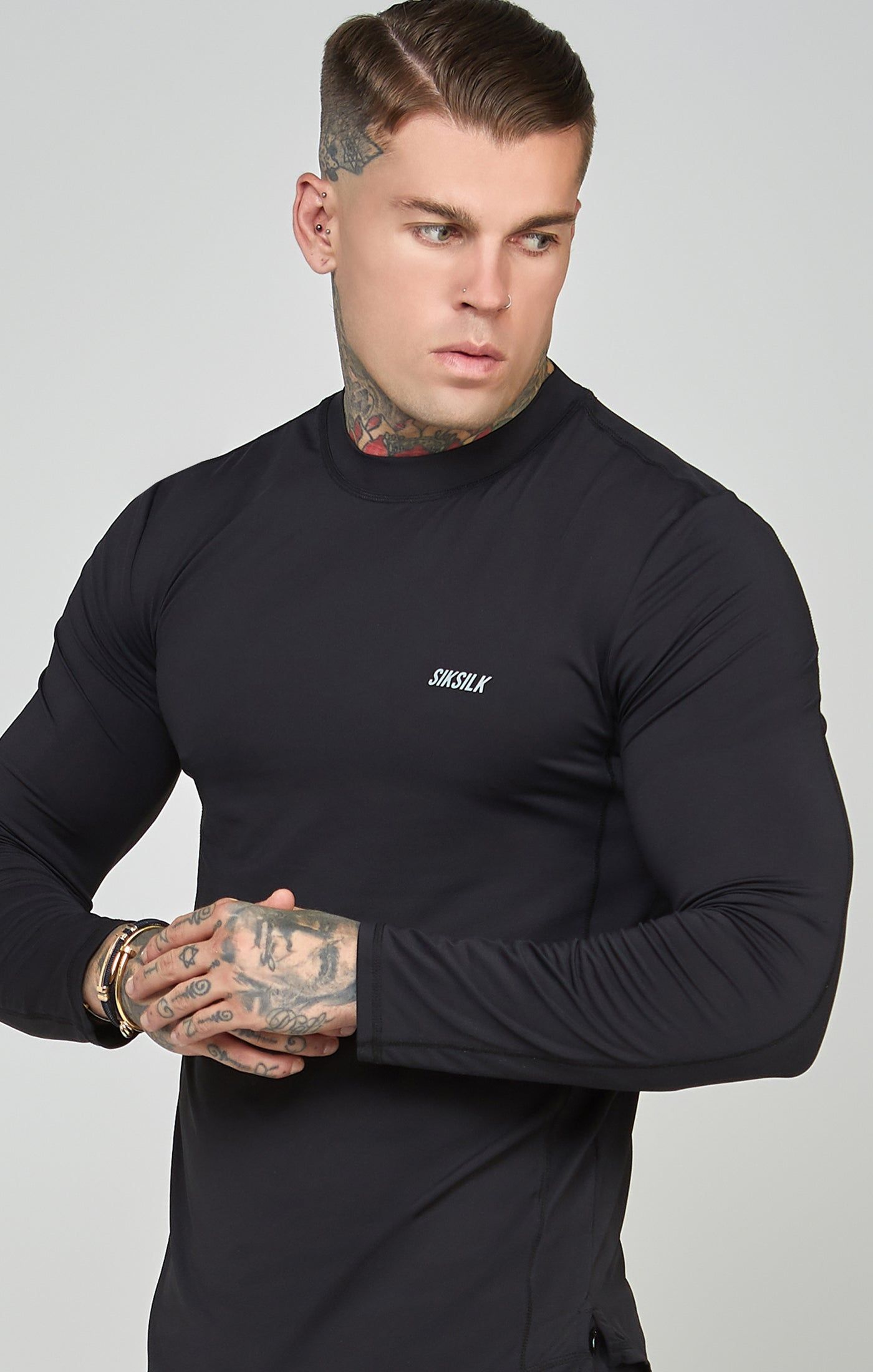 Black Sports Muscle Fit Long Sleeve Top sold by Siksilk