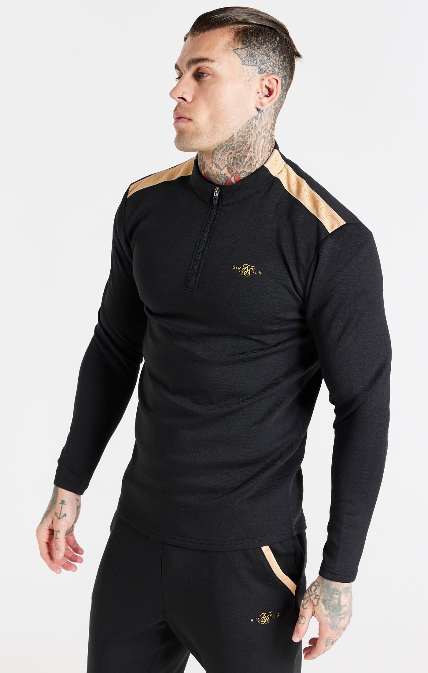 Black Quarter Zip Sport Top sold by Siksilk
