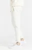 Ecru Half And Half Toggle Cuff Pant sold by Siksilk