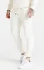 Ecru Half And Half Toggle Cuff Pant sold by Siksilk