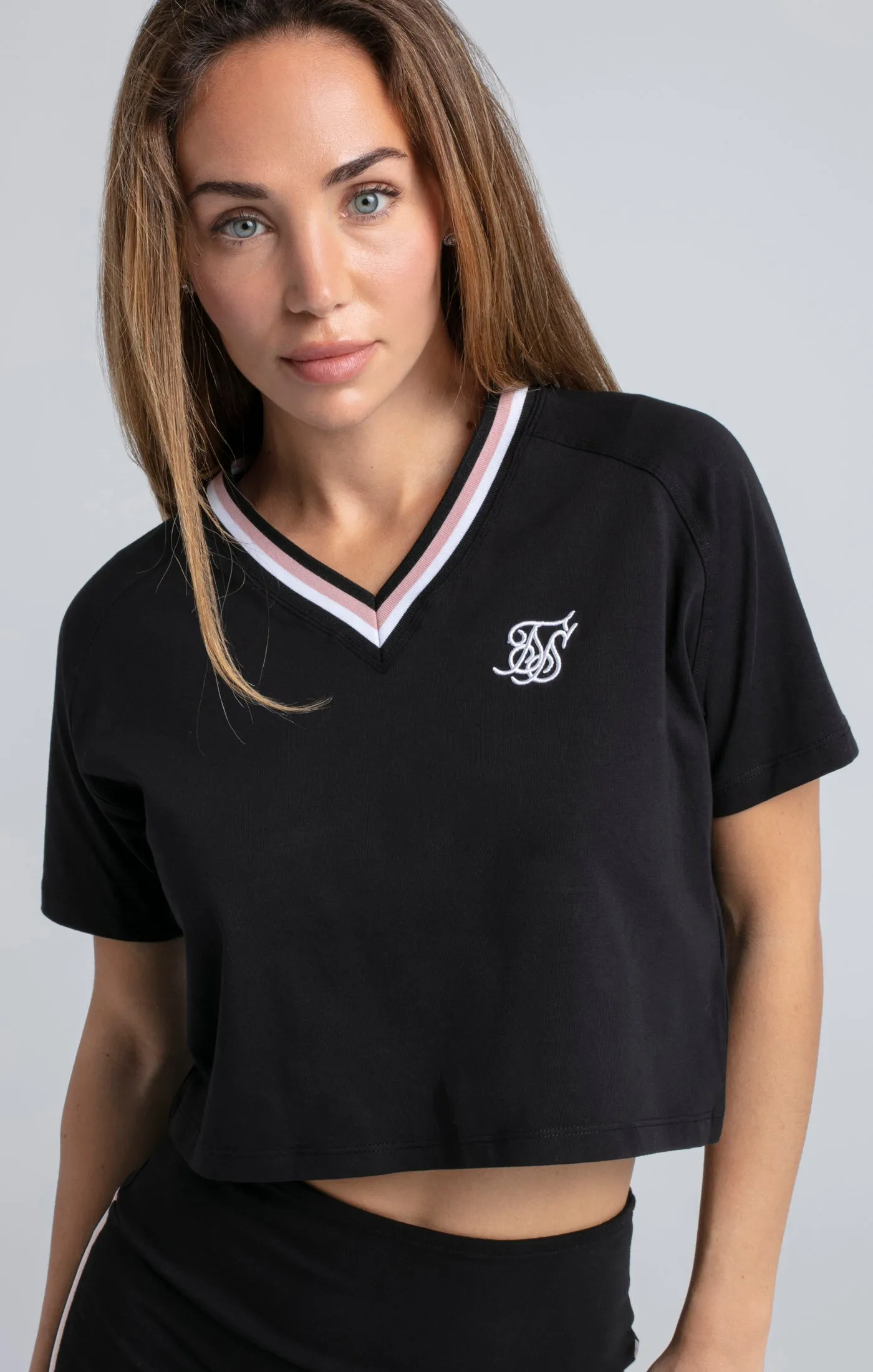 Black Varsity V-Neck Crop T-Shirt sold by Siksilk