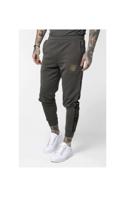 SikSilk Cuffed Cropped Taped Joggers – Cement sold by Siksilk