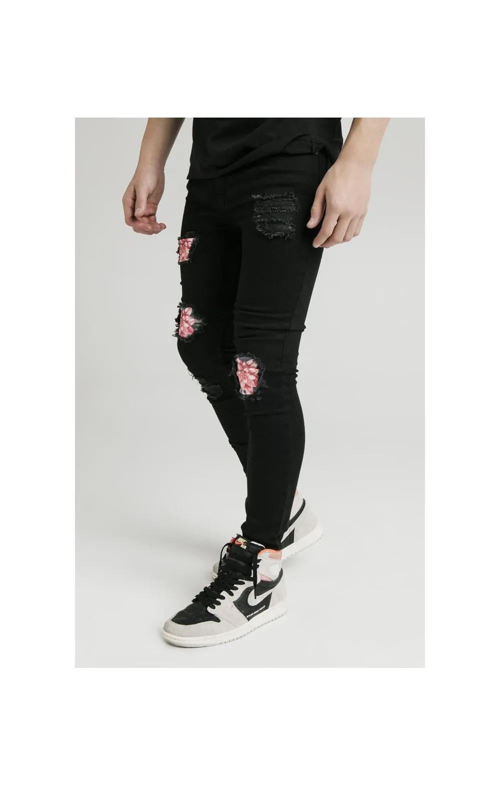 Illusive London Distressed Floral Patch Jeans - Black & Floral sold by Siksilk
