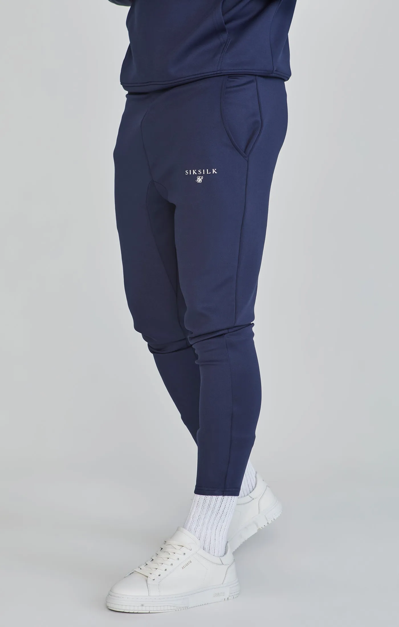 Navy Essentials Poly Joggers sold by Siksilk