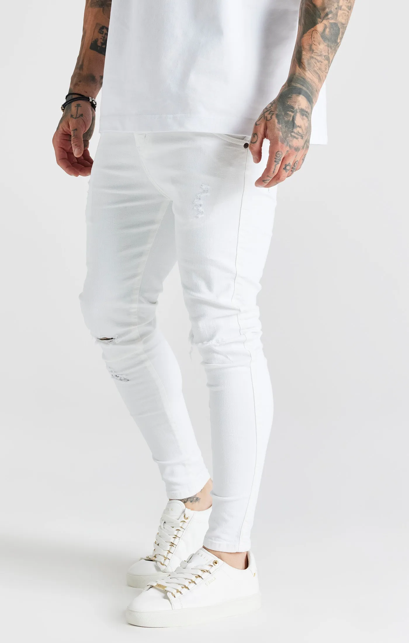 White Essential Distressed Skinny Jean sold by Siksilk