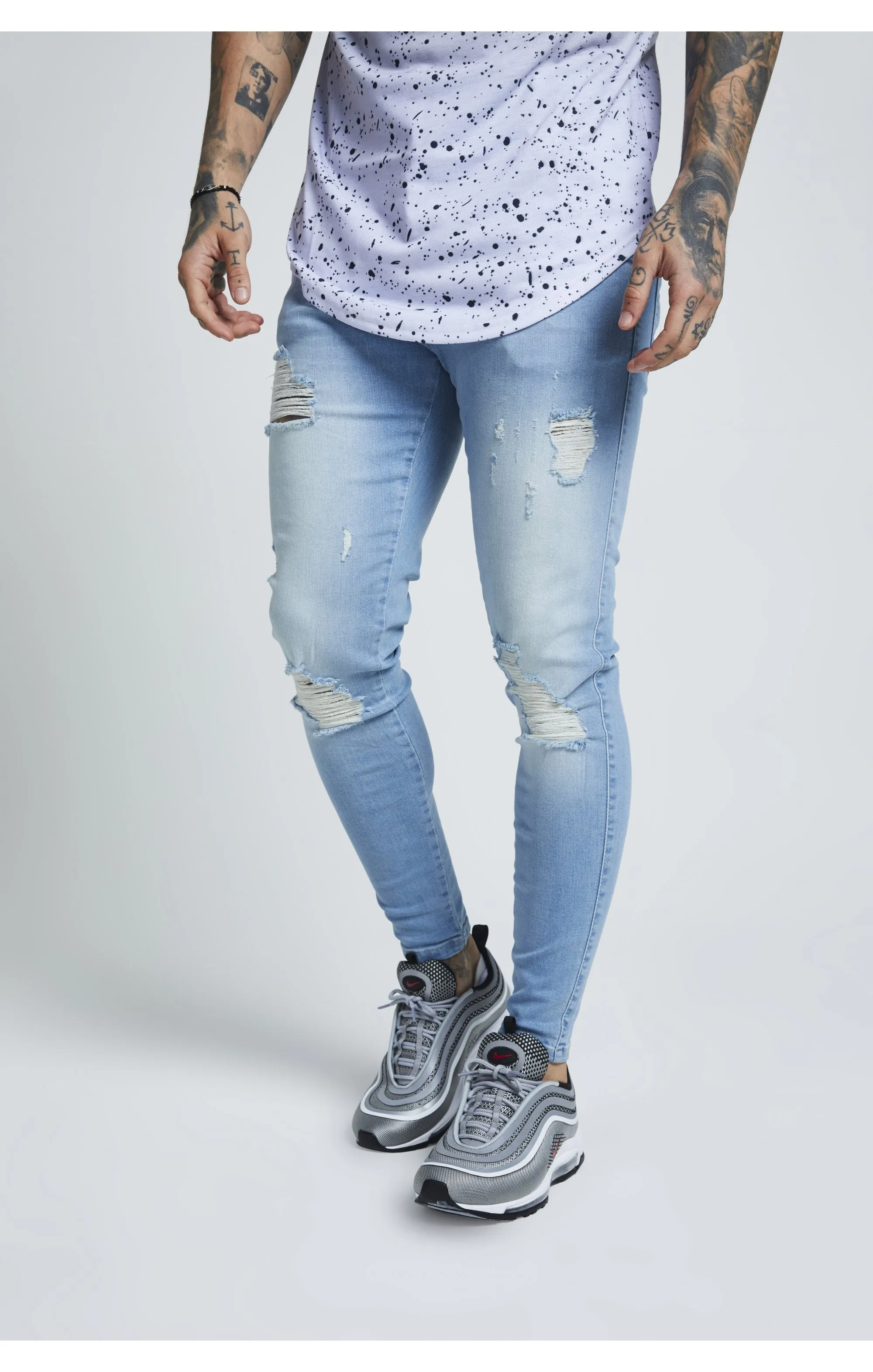 Blue Skinny Distressed Denim sold by Siksilk