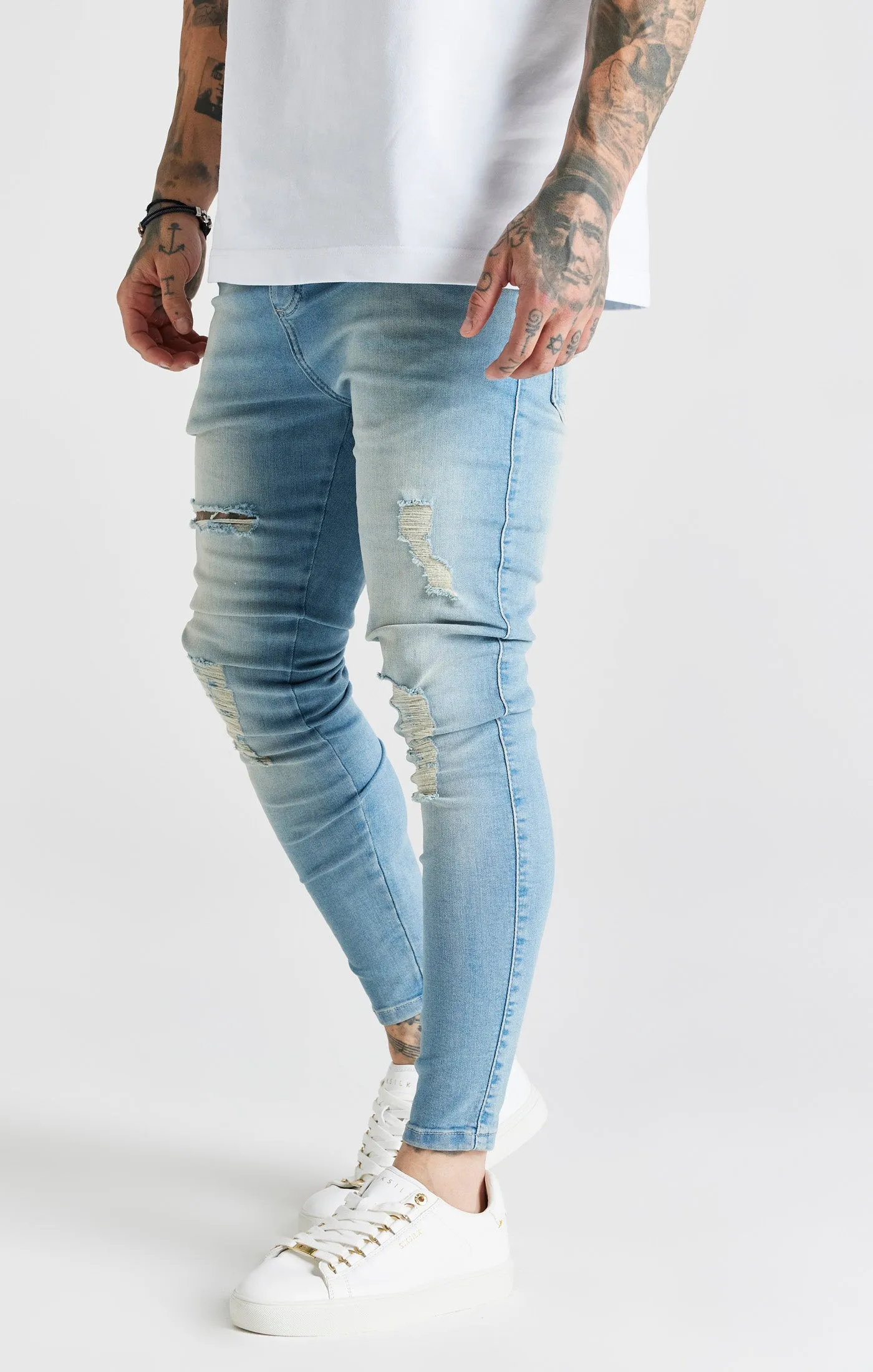 Blue Washed Essential Distressed Skinny Jean sold by Siksilk