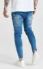Blue Mid Wash Essential Distressed Skinny Jean sold by Siksilk