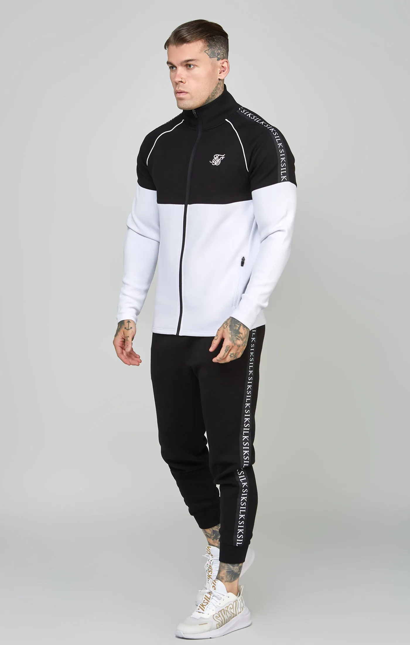 Black Taped Full Zip Top & Jogger Set sold by Siksilk
