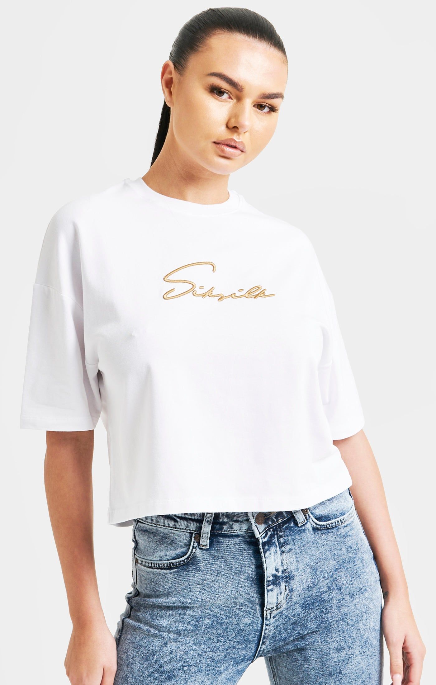 White Signature Crop Tee sold by Siksilk