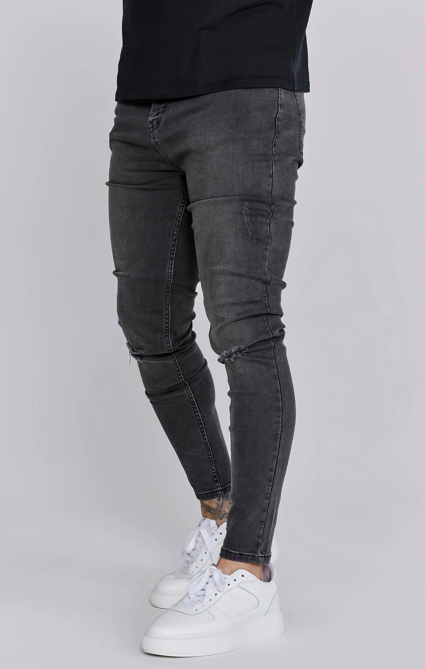 Grey Distressed Skinny Jeans sold by Siksilk