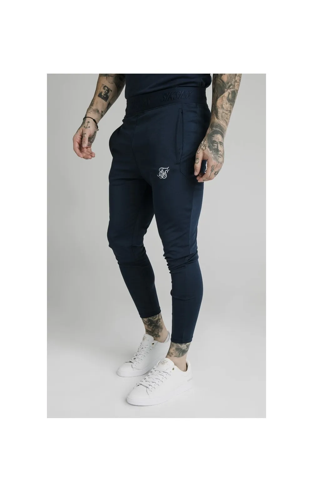 Navy Agility Track Pant sold by Siksilk