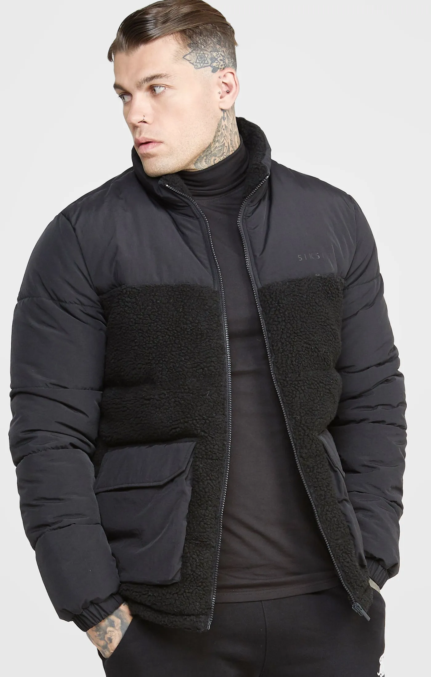 Black Bubble Jacket sold by Siksilk