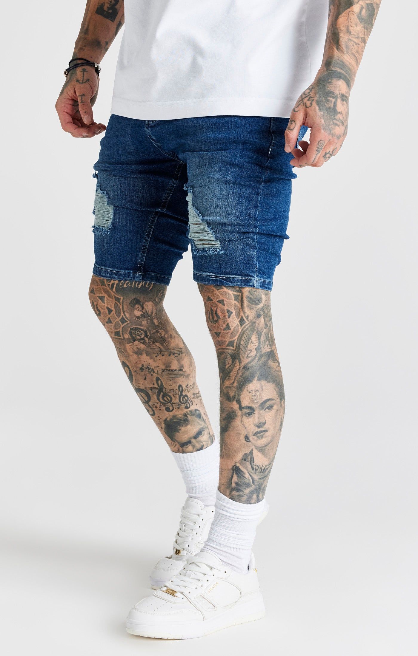 Blue Distressed Denim Short sold by Siksilk