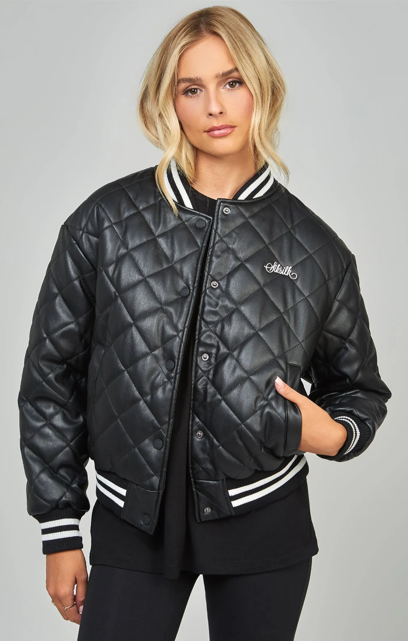 Black Pu Quilted Varsity Jacket sold by Siksilk