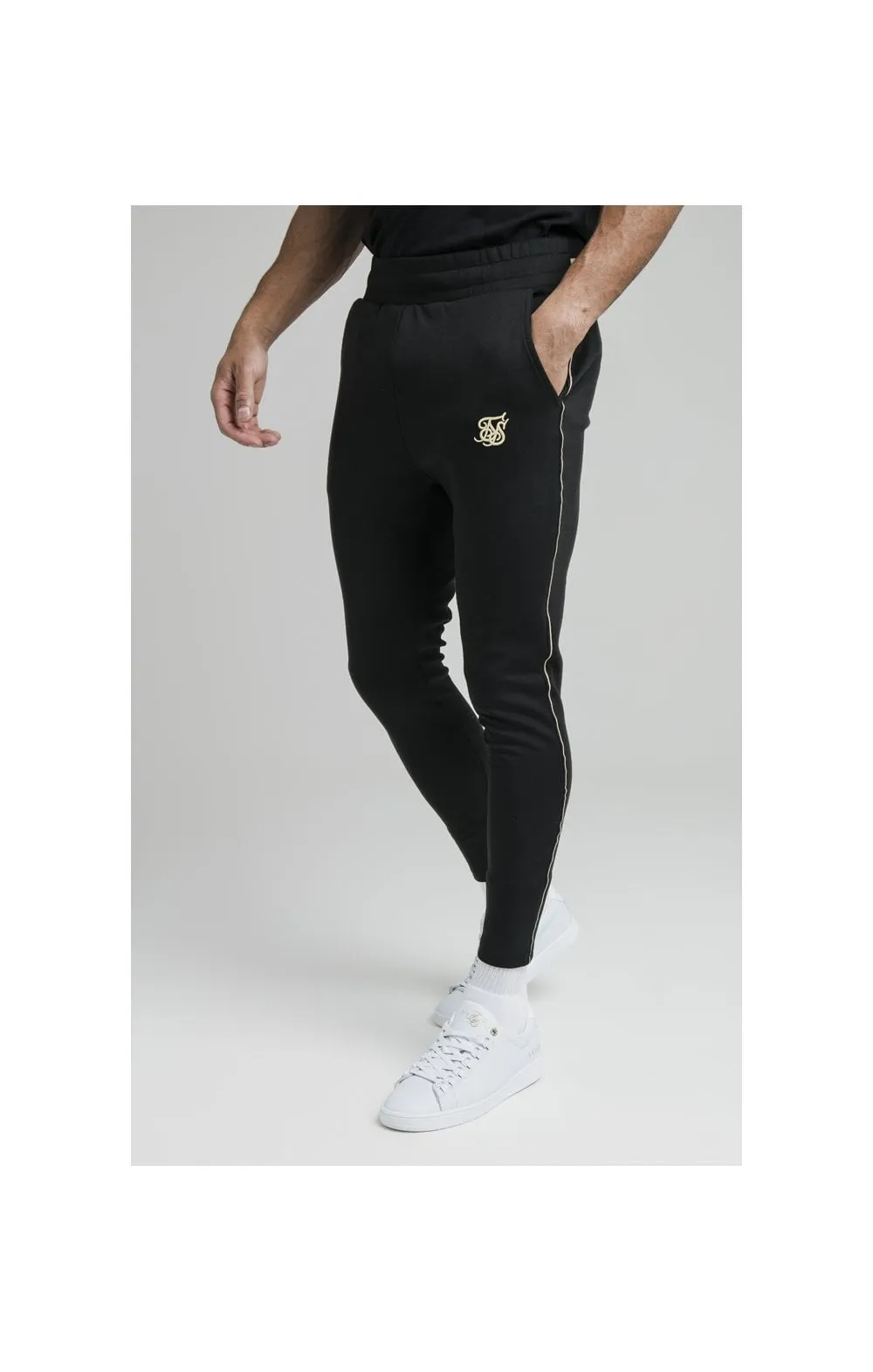 Black Exposed Tape Jogger sold by Siksilk