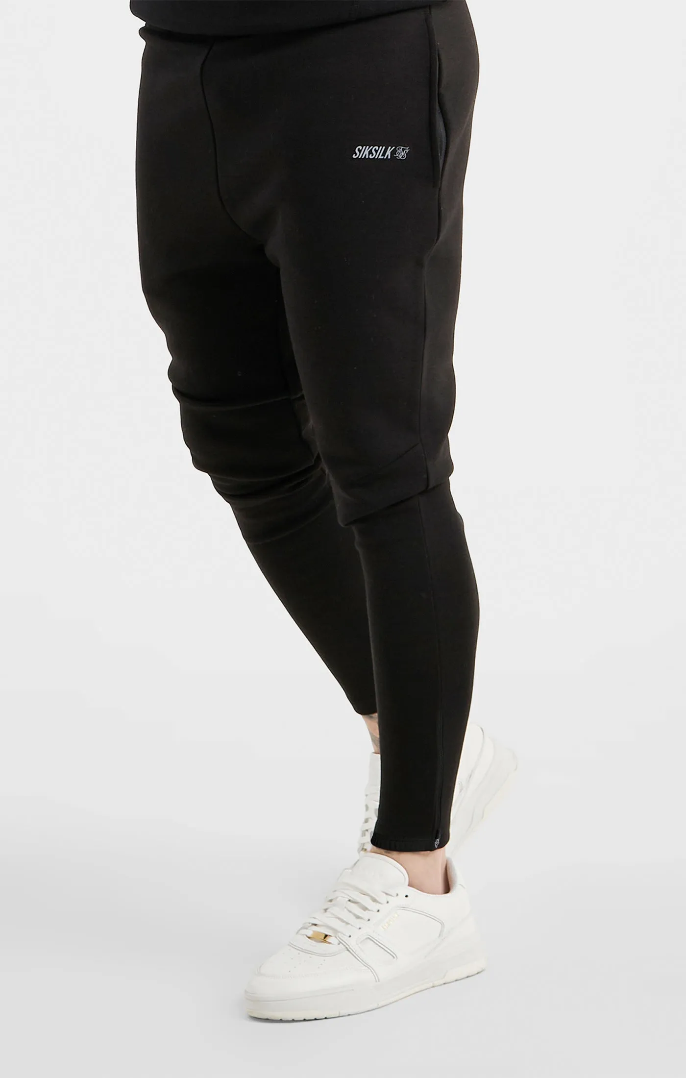 Black Sports Zip Pant sold by Siksilk