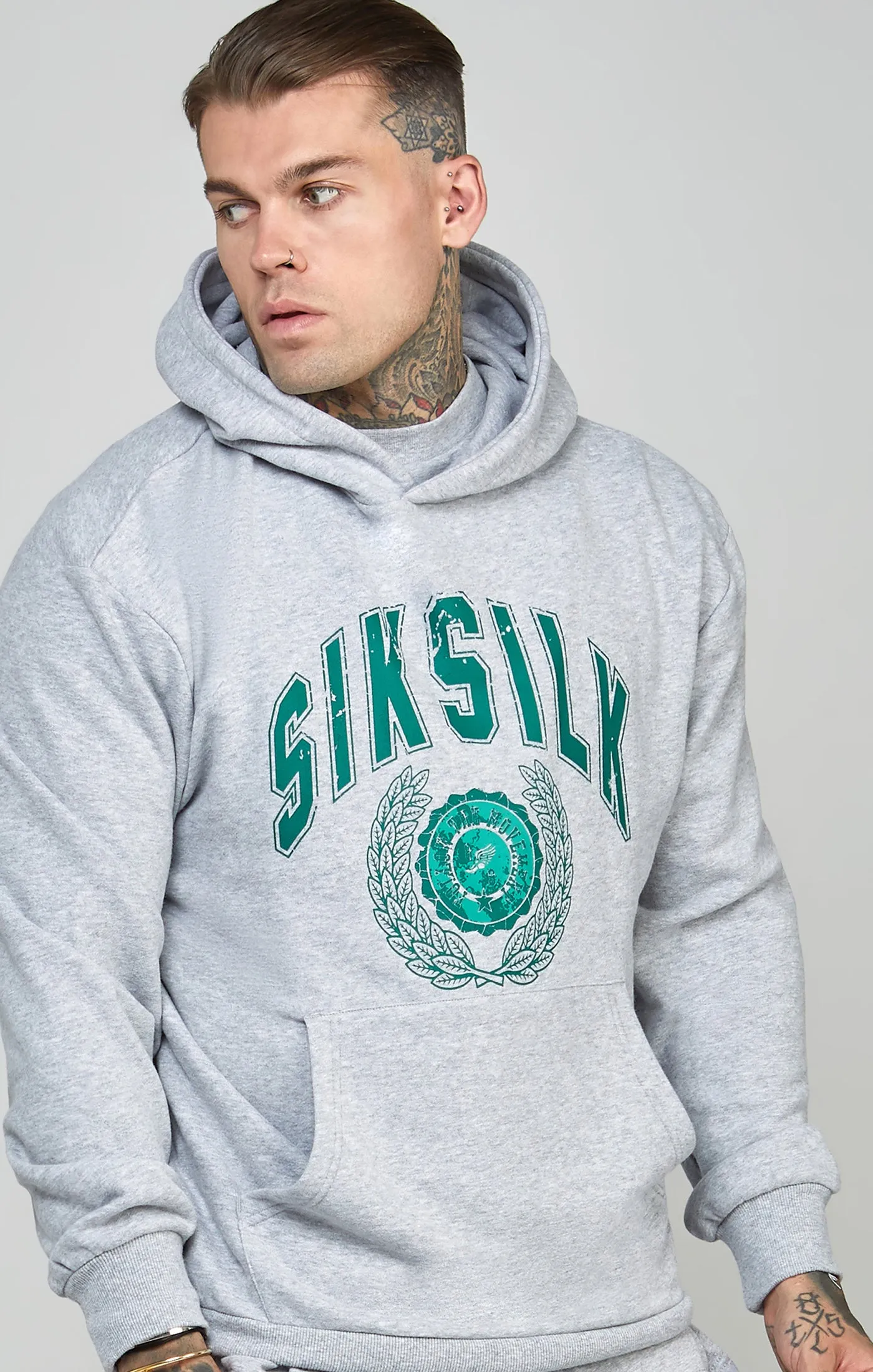 Oversized Varsity Logo Hoodie sold by Siksilk