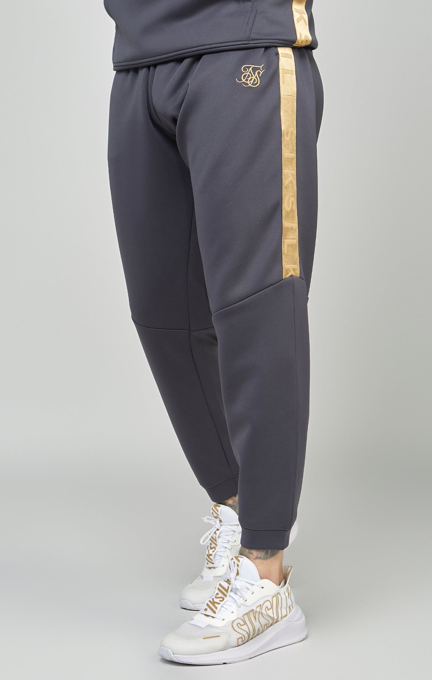 Gold Tape Jogger sold by Siksilk