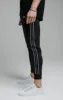 Black Tape Cuffed Pant sold by Siksilk