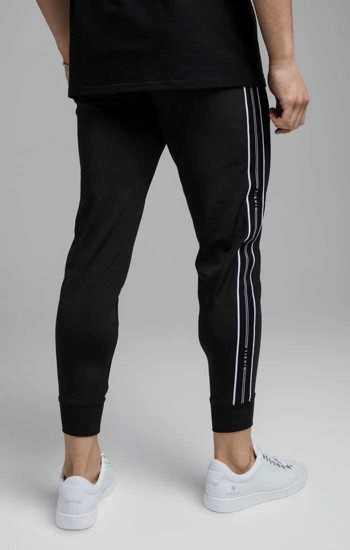 Black Tape Cuffed Pant sold by Siksilk